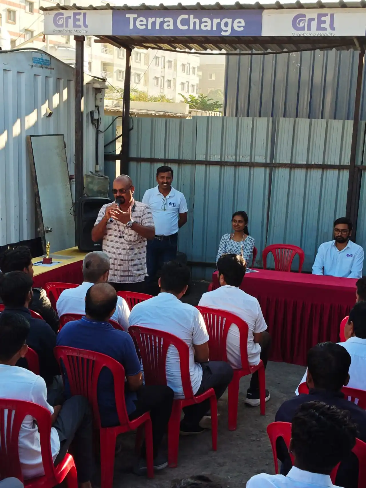 Trainer addressing GrEL driver-partners at the training facility